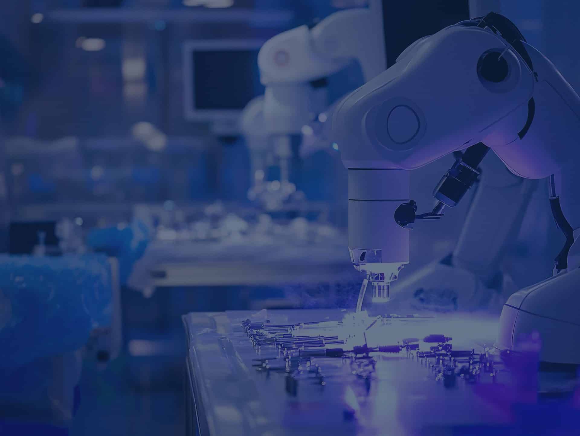 A robotic arm operates over surgical instruments in a medical laboratory, showcasing digital transformation in medtech with monitors and advanced equipment in the background.